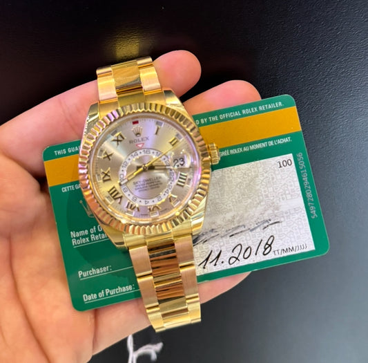 Rolex Sky- Dweller Sundust Roman Dial YG